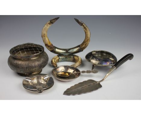 A selection of eastern white metal items comprising; a pair of Chinese Kwang-Province coin set ashtrays, a Mohd Salleh & Sons