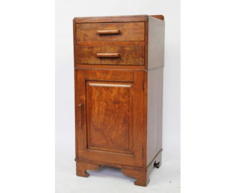 An Edwardian oak bedside cabinet, with two drawers and cupboard door, on bracket feet, 76cm H x 36cm W, with a pair of vintag