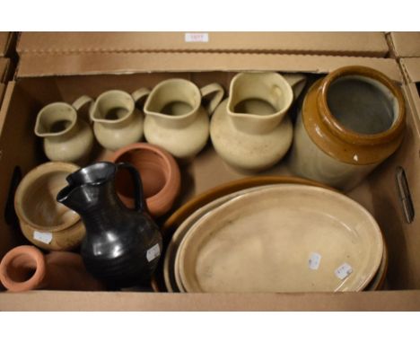 Four pottery graduated jugs in speckle glaze, a Prinknash ironstone jug, four ovenware dishes in assorted sizes and a salt gl