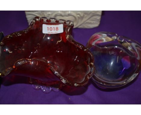 A vintage art glass bowl in a pink and purple fade signed to base, with a similar Ruby red dish.