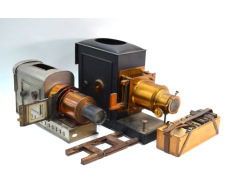 Two brass-mounted tin magic lantern projectors (both converted to electricity) to/w approx 50 slides mostly continental city 