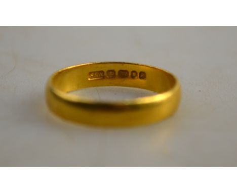 A 22ct yellow gold wedding band, size M 1/2, approx 3g