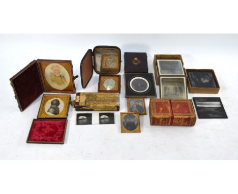 Two Dagguerotypes - lady and gentleman, to/w two ambrotypes, various other 19th century photographs including steroscopic con