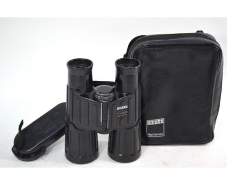 A pair of Zeiss 10 x 40B rubber-armoured binoculars, no 1930211, in branded soft case   Condition Report  good overall althou