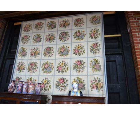 A large Aubusson style carpet, worked with field panels of floral sprays on a cream ground, 365 x 260 cm