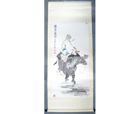 A Chinese, hanging scroll picture of Laozi seated on the back of a water buffalo; similar to an original by Fan Zeng; single-