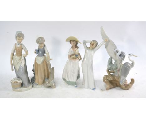 Five Nao figures - Child yawning, 20 cm; Girl with basket, 22 cm; Girl with washing, 23 cm; Girl with butterfly, 22 cm and Tw