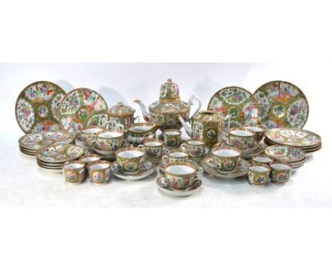 A Canton famille rose part service, comprising: a teapot and domed cover; a large jug, 18 cm long; a bowl and cover, 12 cm  w