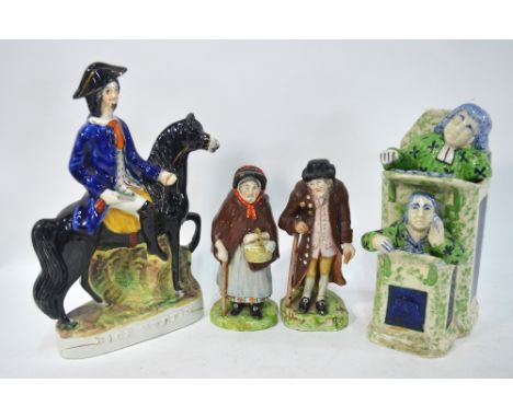 A 19th century Staffordshire figure of Dick Turpin, 29.5 cm high, to/w a Ralph Wood style pottery model of The Vicar and Mose