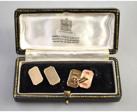 A pair of rectangular engine turned 9ct chain link cufflinks, in fitted box by Hamilton & Co, Calcutta, approx 6g