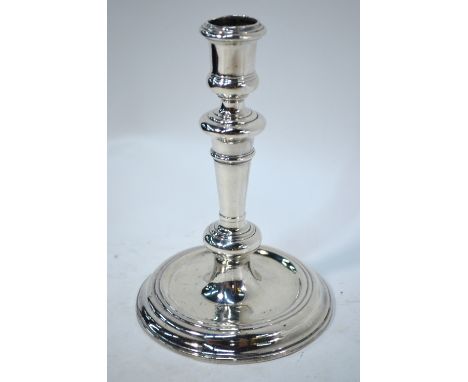 A single George I cast Britannia Standard baluster candlestick with dished circular base, David Willaume, London 1715, 16.2oz