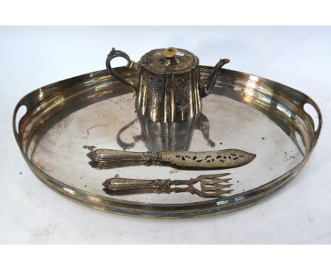 A pair of Victorian silver fish servers with engraved blades and loaded handles, John Gammage, Birmingham 1849, to/w an oval 