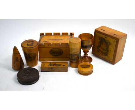 A Mauchlin ware dice-box, castellated money box, needle case and egg-cup, to/w similar treen items including snuff box, trink