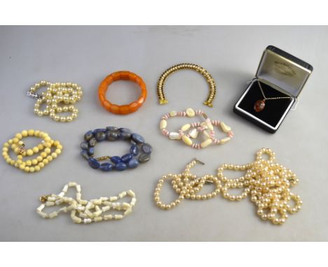 A collection of fashion jewellery including blue dyed agate tumbled bead necklace, shell bead necklaces, three rows of simula