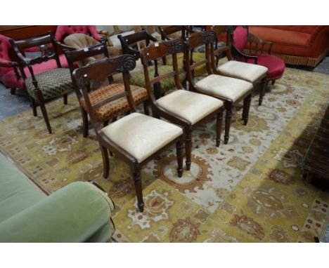 An Indian Agra carpet, the central reserve with floral motifs and scrolling tendrils on cream ground, wide camel border with 