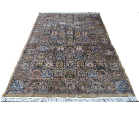 An Indo/Persian rug, the field with multi tile designs of differing floral motifs,  2.95 x 1.85 m   Condition Report  good ov