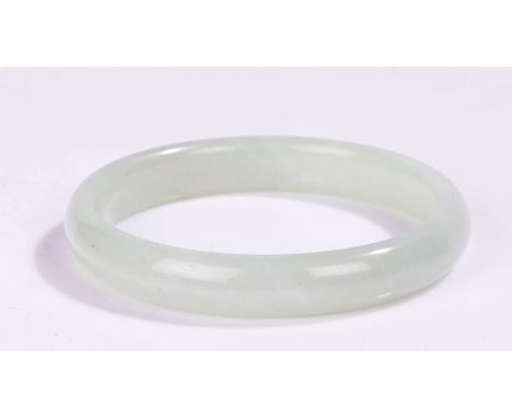 Chinese celadon jadeite bangle, 81mm diameter 