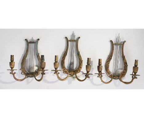 Set of three Regency style brass twin branch wall lights, of U shaped form and beast light branches, each approx. 30cm long (