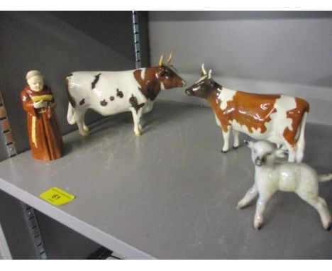 A Beswick Whitehall Mandate bull, a Beswick Bessie model of a cow, a Beswick model of a lamb and a Royal Worcester candle snu