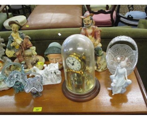 A Gustava Becker anniversary clock under a dome, an early 20th century porcelain humidor, a Nao figurine and others 