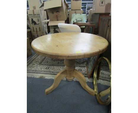 A pine circular topped pedestal breakfast table, 30" h, 36" dia, along with two light wood kitchen chairs with loose cushions