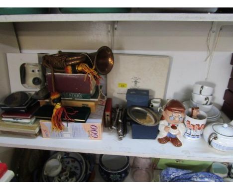 A mixed lot to include a copper and brass bugle, nut crackers, framed and glazed fossil, glassware, ceramics and other items 