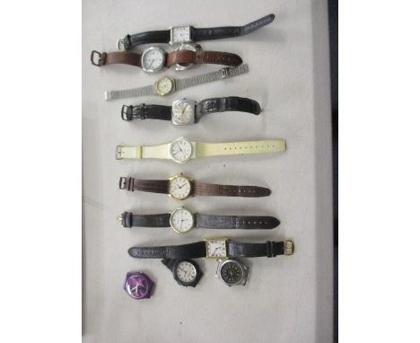 A selection of ladies and gentleman's wristwatches including a Hausser and Sacks and a Timex quartz 