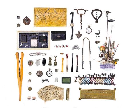 A collection of various hatpins. Together with two 19th Century iron corkscrews, brass cribbage board, various cigarette hold
