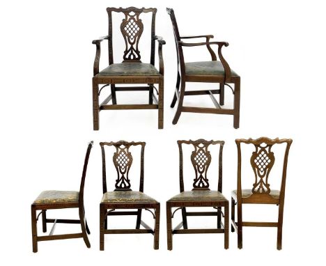 A set of six 19th century mahogany dining chairs in the Chinese Chippendale manner.  With pierced vase splat back and blind f