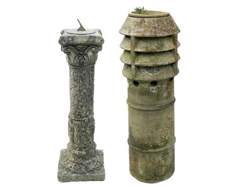 A brass sundial on a reconstituted stone column.  Height 82cm together with a tall terracotta chimney pot.