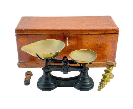 A late Victorian oak twin handle box. Height 22cm width 54cm depth 23cm, together with a set of cast iron scales and various 