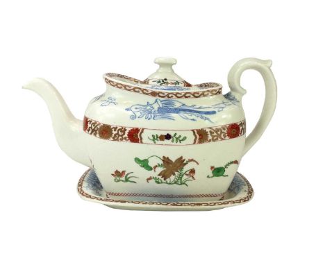 A Spode teapot, cover and stand. Circa 1815, with underglaze blue, polychrome and gilt decoration, pattern number 2638, in th