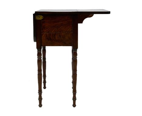 An unusual William IV mahogany bedside table. Fitted one real and a sham flap, which lowers by pushing a brass button to reve