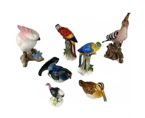 A collection of seven continental ceramic birds.  To include a Herend pottery helmeted guineafowl, a Kunstabteilung porcelain