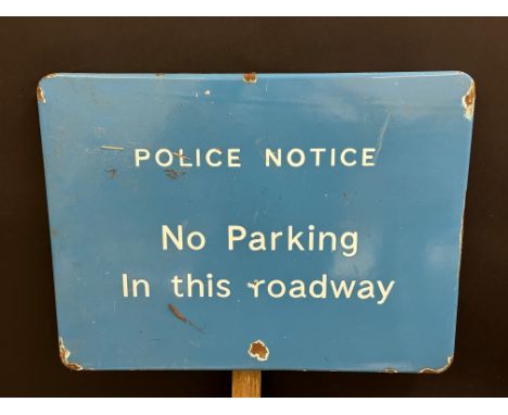 A Police Notice enamel sign bearing the instruction 'No Parking In this roadway', 24 x 18" (measurements exclude wooden pole)