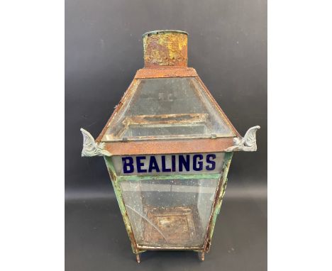 A late Victorian glass lantern with railway station name of Bealings (Suffolk) to one side, 28" h.
