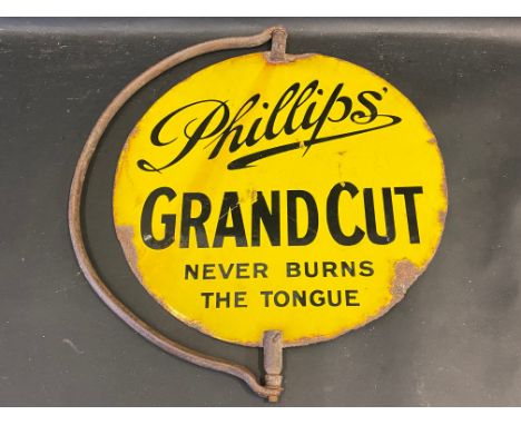 A circular double sided enamel sign on a revolving bracket, to one side advertising Phillips' Grand Cut, BDV the verso, the s