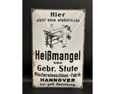 A Continental pictorial enamel sign advertising a rotary iron, made at a factory in Hannover, 15 1/2 x 23 1/2".