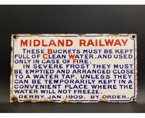 A Midland Railway 'Buckets must be kept full of clean water...Derby Jan. 1909' rectangular enamel sign in very good condition