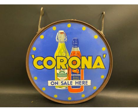 A Corona fruit drinks 'on sale here' pictorial double sided enamel sign in original metal frame, excellent condition, 17 1/2"