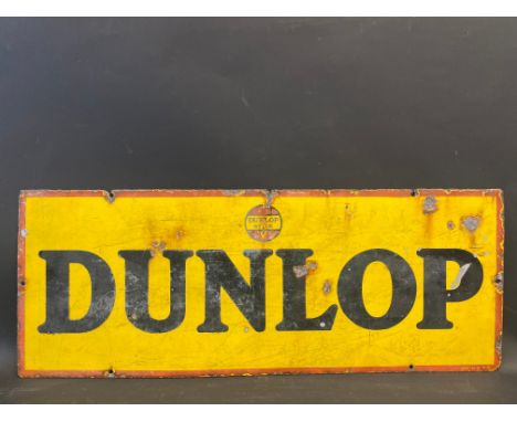 A Dunlop rectangular enamel sign, 30 x 11 1/2". 