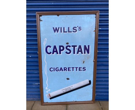 A large Wills's Capstan Cigarettes enamel sign with image of a lit cigarette, 38 1/4 x 62 1/4".