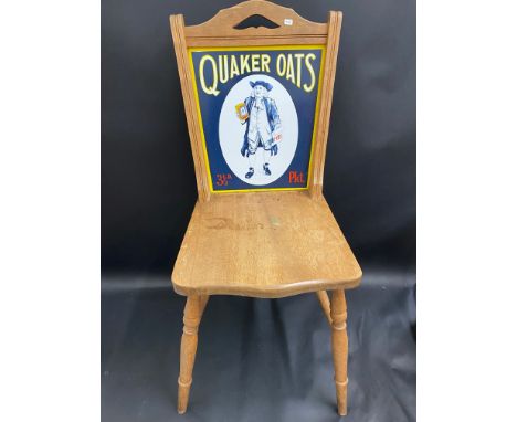 An older reproduction Quaker Oats advertising department store style chair, the enamel sign back stamped Relic Designs of Lon
