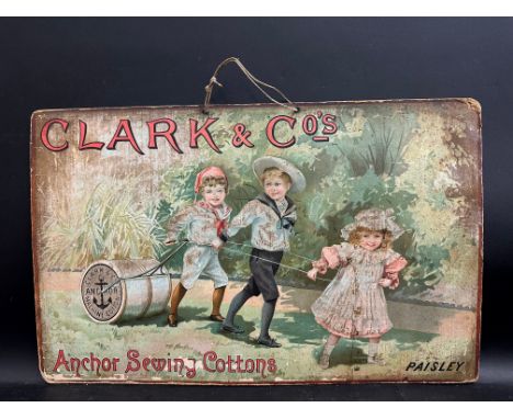 An early showcard advertising Clark &amp; Co's Anchor Sewing Cottons, with a scene of three young children pulling a garden r