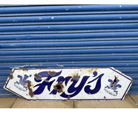 An unusually shaped Fry's chocolate enamel sign, with Prince of Wales feathers to each end, possibly from a tram, 53 x 13 1/2