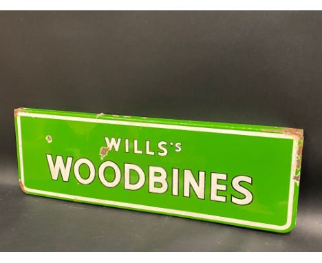 A Wills's Woodbines rectangular enamel sign of good bright colour, 28 x 9".