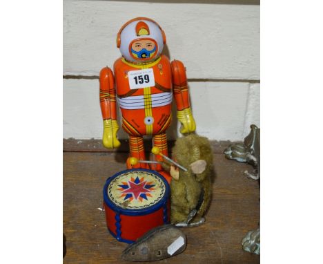 A Vintage Clockwork Model Robot, Together With A Clockwork Monkey & Drum Etc