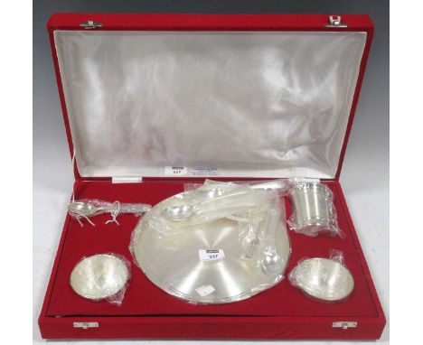 Silver plated child's tableware by Deval Munsif &amp; Co, with dish, 2 small bowls, cup, with Mickey Mouse engraved design, a
