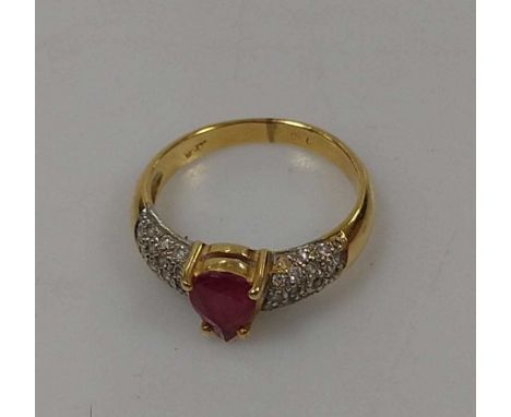 A glass filled ruby and diamond ring, tested as 18ct gold, weight 3g