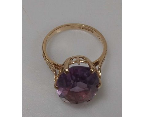 A hallmarked 9ct gold citrine pendant and a hallmarked 9ct gold amethyst ring, gross weight 12g, together with a hallmarked s